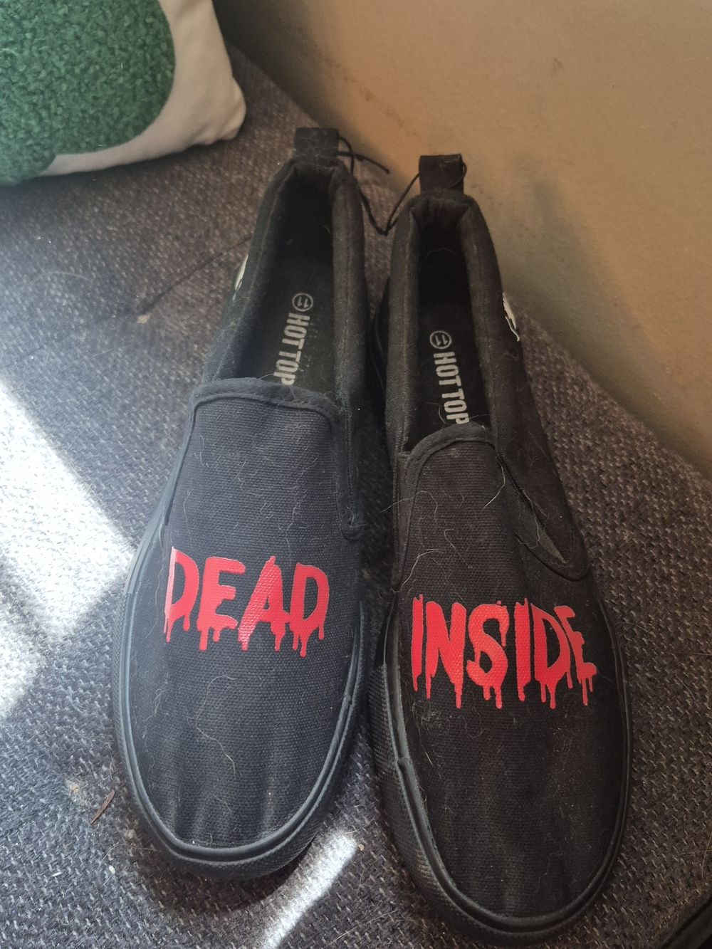 Hot Topic Black Slip-On Shoes with White Skull Accent
